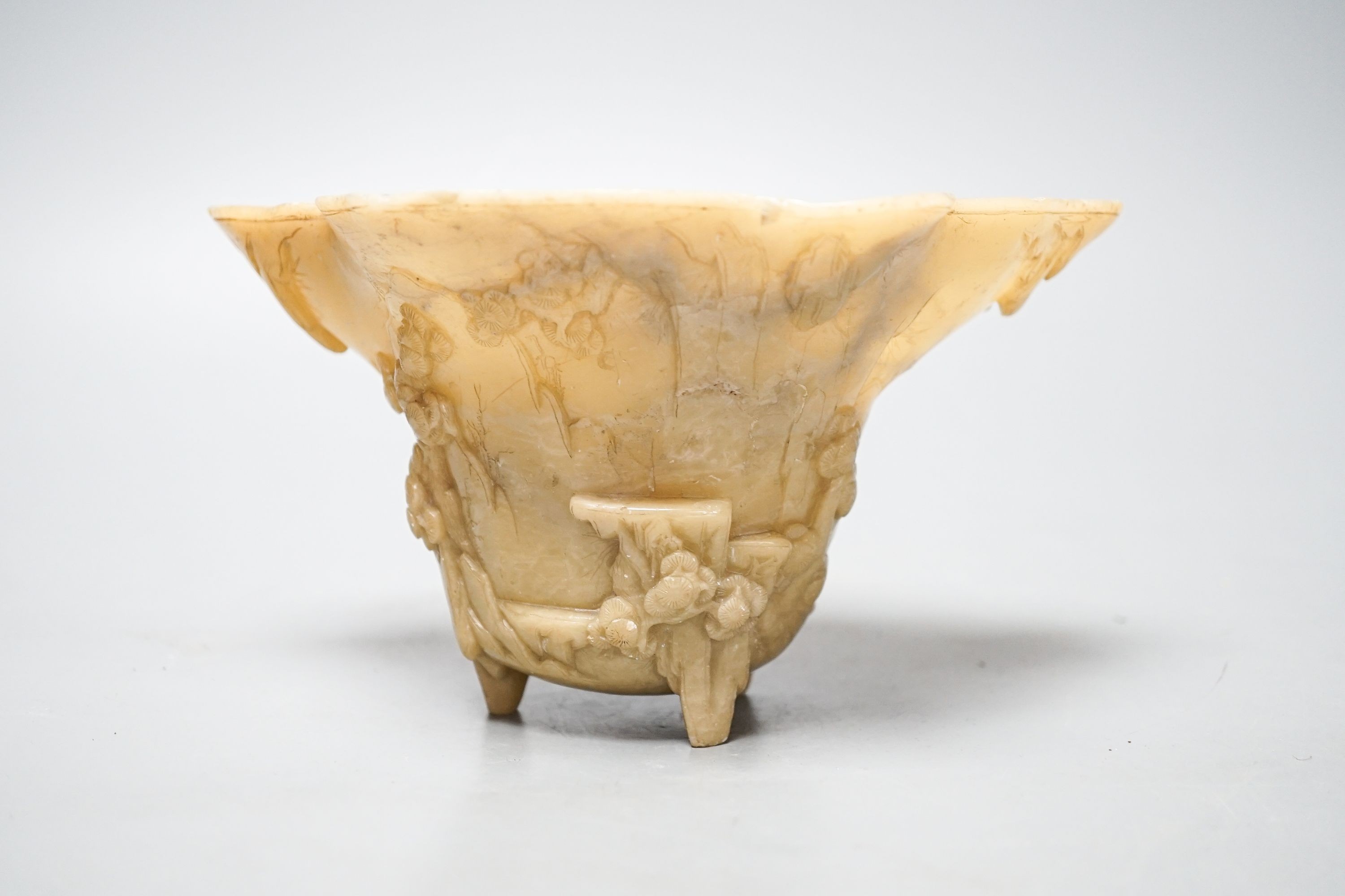 A Chinese carved soapstone libation cup, 19cm